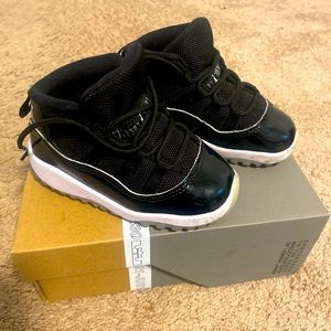 Black Jordan Retro 11's with white sole